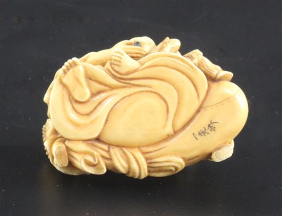 A Japanese ivory okimono of Hotei and three boys, signed Ikkosai, Meiji period, 4.6cm, wood stand